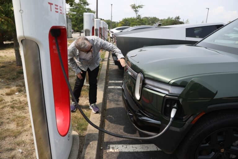 rivian tesla supercharger Getty